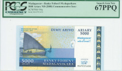 MADAGASCAR: 5000 Ariary (ND 2008) in dark blue and yellow with two fishing boats at left. S/N: "MAP931650". WMK: Zebu head. Printed by (G&D). Inside h...