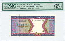 MAURITANIA: 100 Ouguiya (28.11.1999) in purple, violet and brown on multicolor unpt with ornate design. S/N: "L014 60636". WMK: Bearded man. Printed b...