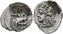 CILICIA. Nagidos. Circa 400-380 BC. Obol (Silver, 11 mm, 0.74 g, 11 h). Baaltars seated left, holding lotus-tipped scepter in his right hand and resti...