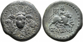 CILICIA. Soloi. Circa 100-30 BC. AE (Bronze, 22 mm, 10.11 g, 1 h). Facing gorgoneion at center of aegis. Rev. ΣΟΛEΩN Aphrodite, turreted, riding bull ...