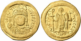 Justinian I, 527-565. Solidus (Gold, 20 mm, 4.47 g, 7 h), Constantinopolis, 545-565. D N IVSTINIANVS P P AVI Helmeted and cuirassed bust of Justinian ...