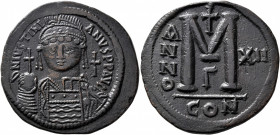 Justinian I, 527-565. Follis (Bronze, 40 mm, 23.38 g, 6 h), Constantinopolis, RY 12 = 538/9. D N IVSTINIANVS P P AVI Helmeted and cuirassed bust of Ju...