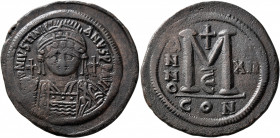 Justinian I, 527-565. Follis (Bronze, 40 mm, 22.07 g, 6 h), Constantinopolis, RY 12 = 538/9. D N IVSTINIANVS P P AVI Helmeted and cuirassed bust of Ju...