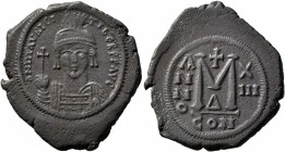 Maurice Tiberius, 582-602. Follis (Bronze, 34 mm, 11.86 g, 6 h), Constantinopolis, RY 13 = AD 594/5. D N MAVRC TibЄR P P AVG Helmeted and cuirassed bu...