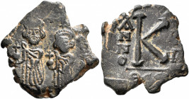 Heraclius, with Heraclius Constantine, 610-641. Half Follis (Bronze, 21 mm, 3.45 g, 5 h), Thessalonica, 613-619. Heraclius, on the left, standing faci...
