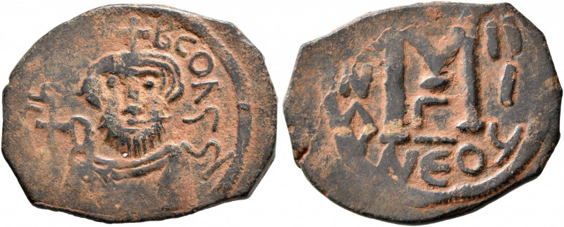 ISLAMIC, Time of the Rashidun. Pseudo-Byzantine types. Fals (Bronze, 20x25 mm, 4...