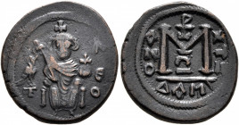 ISLAMIC, Umayyad Caliphate. temp. Mu'awiya I ibn Abi Sufyan, AH 41-60 / AD 661-680. Fals (Bronze, 20 mm, 3.87 g, 6 h). Imperial figure seated facing, ...