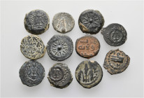 A lot containing 11 bronze coins. Includes: Judaea and Islamic. Fine to very fine. LOT SOLD AS IS, NO RETURNS. 11 coins in lot.