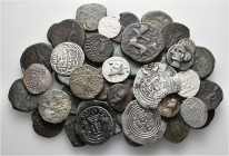 A lot containing 16 silver and 33 bronze coins. Includes: Greek, Oriental Greek, Central Asian (2 coins broken) and Islamic. Fair to about very fine. ...
