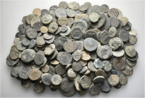 A lot containing 257 bronze coins. Includes: Greek, Roman Provincial, Roman Imperial, Byzantine, Islamic, Medieval and Modern. Fair to about fine. LOT...