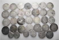 A lot containing 33 silver coins. All: Islamic. About very fine to good very fine. LOT SOLD AS IS, NO RETURNS. 33 coins in lot.
