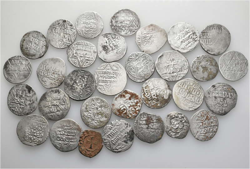 A lot containing 30 silver and 1 bronze coin. All: Islamic. Fine to about about ...