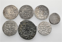 A lot containing 6 silver and 1 bronze coins. All: Islamic. Fine to very fine. LOT SOLD AS IS, NO RETURNS. 7 coins in lot.