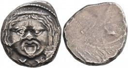 ETRURIA. Populonia. Circa 300-250 BC. 20 Asses (Silver, 21 mm, 7.95 g). Diademed facing head of Metus with protruding tongue; below, X:X (mark of valu...