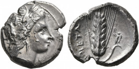 LUCANIA. Metapontion. Circa 330-290 BC. Didrachm or Nomos (Silver, 21 mm, 7.67 g, 3 h). Head of Demeter to right, wearing wreath of grain ears, triple...