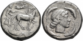 SICILY. Syracuse. Second Democracy, 466-405 BC. Tetradrachm (Silver, 25 mm, 16.99 g, 7 h), circa 450-440. Charioteer driving quadriga walking to right...