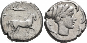 SICILY. Syracuse. Second Democracy, 466-405 BC. Tetradrachm (Silver, 25 mm, 17.16 g, 7 h), circa 430-420. Charioteer driving quadriga walking to right...