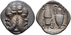 ISLANDS OFF THRACE, Thasos. Circa 412-404 BC. Diobol (Silver, 14 mm, 1.51 g, 6 h). Janiform satyr head. Rev. Θ-Α-Σ-Ι Two amphorae, one upright, the ot...