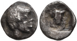 PHOKIS, Federal Coinage. Early 5th century BC. Hemiobol (Silver, 8 mm, 0.48 g, 12 h), Delphi. Head of a male Ethiopian to right. Rev. Head of a goat f...