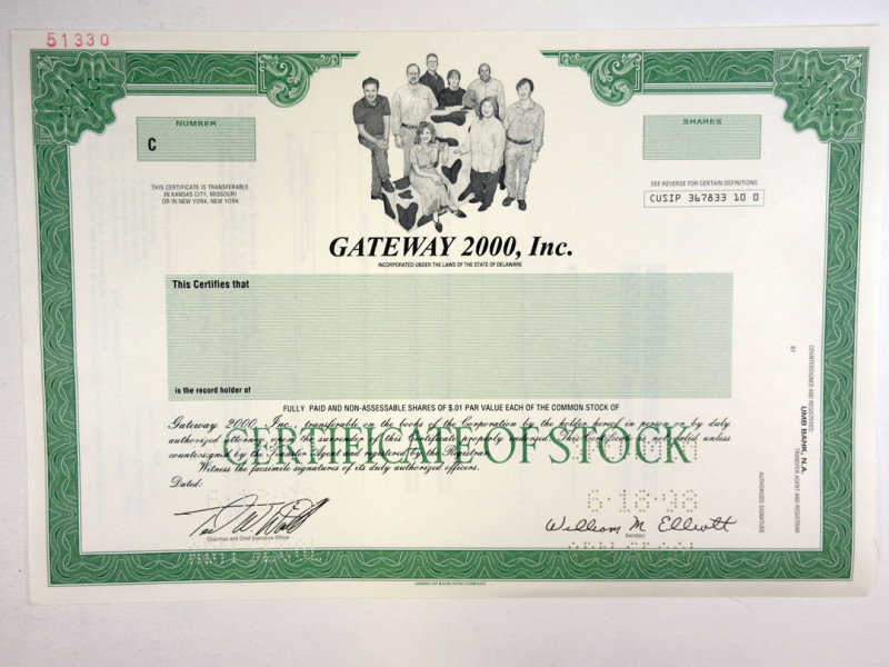 Delaware. Specimen Odd Shares Common Stock Certificate. Black print with green b...