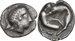 Greek Italy. Southern Apulia, Tarentum. AR Diobol, c. 4th-3rd cent. BC. Contemporary imitation of Tarentine Diobol. Obv. Helmeted head of Athena right...