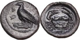 Sicily. Akragas. AR Litra, c. 450-440 BC. Obv. [AK]-PA (retrograde). Eagle standing left on Ionic capital. Rev. Crab; ΛI (mark of value) below. HGC 2 ...