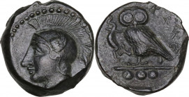 Sicily. Kamarina. AE Tetras or Trionkion, c. 410-405 BC. Obv. Head of Athena left, wearing crested Attic helmet decorated with wing. Rev. Owl standing...