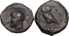 Sicily. Kamarina. AE Tetras or Trionkion, c. 410-405 BC. Obv. Head of Athena left, wearing crested Attic helmet decorated with wing. Rev. KAMA. Owl st...