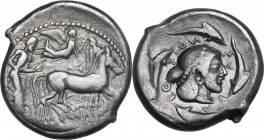 Sicily. Syracuse. Hieron I (478-466 BC). AR Tetradrachm, c. 475-470 BC. Obv. Charioteer driving quadriga right, holding kentron and reins; above, Nike...