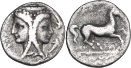Sicily. Syracuse. Timoleon and the Third Democracy (344-317). AR Dilitron, c. 344-317 BC. Obv. Janiform female head; two dolphins to right. Rev. Horse...