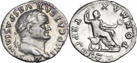 Vespasian (69 -79). AR Denarius, 74 AD. Obv. IMP CAESAR VESPASIANVS AVG. Laureate bust right. Rev. PON MAX TR P COS V. Vespasian seated right on curul...