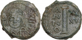 Justinian I (527-565). AE Decanummium. Ravenna mint. Dated RY 36 (562/3). Obv. Helmeted and cuirassed bust facing, holding globus cruciger and shield....