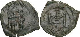 Constans II (641-668). AE Follis, Sicily circa 654-659. Obv. Constans II and Constantine IV standing facing. Rev. Large M; above, monogram; below, SCL...