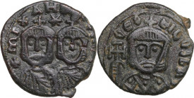 Theophilus (829-842). AE Follis, Syracuse mint. Obv. Bust facing of Theophilus, wearing crown and loros, and holding cross potent. Rev. Facing busts o...