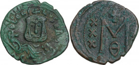 Theophilus (829-842 AD). AE Follis. Struck 830-842 AD. Syracuse mint. Obv. ΘEOFI-LOS bASI. Crowned and draped bust facing, holding globus cruciger. Re...