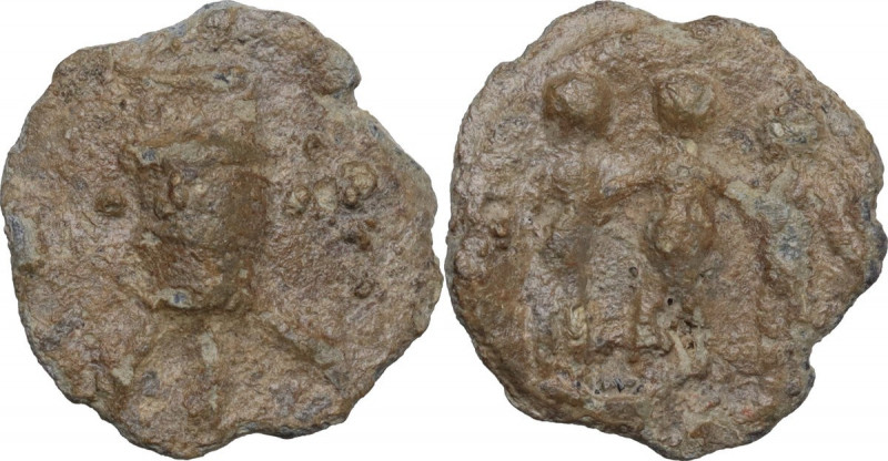 Leads from Ancient World. PB Tessera. Obv. Modius with three stalks of grain. Re...