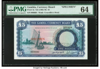 Gambia The Gambia Currency Board 5 Pounds ND (1965-70) Pick 3s Specimen PMG Choice Uncirculated 64. A roulette Specimen punch and red Specimen overpri...