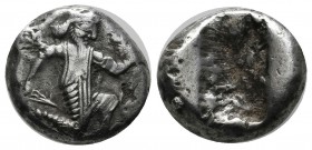 Achaemenid Kingdom. Circa 455-420 BC. AR Siglos (16mm, 5.61g). Persian king or hero in kneeling / running stance right, holding dagger and bow. / Incu...