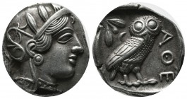 Attica, Athens. Circa 454-404 BC. AR Tetradrachm (25mm, 17.00g). Head of Athena right, wearing earring, necklace, and crested Attic helmet decorated w...