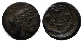 Bithynia, Kios. Circa 300 BC. AE (12mm, 1.36g). Head of Mithras right, wearing a laureate tiara. / KI, kantharos with two grape vines; all within grai...
