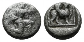 Caria, Kaunos. Circa 490-470 BC. AR Trihemiobol (9mm, 1.20g). Winged Iris with outstretched hands in kneeling-running position to right, head left. / ...