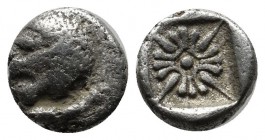 Ionia, Miletos. Late 6th-early 5th century BC. AR Obol – Hemihekte (9mm, 0.98g). Forepart of lion right, head reverted. / Stellate pattern within incu...
