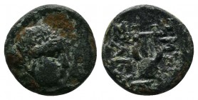 Ionia, Smyrna, (c.115-105 BC.) AE (11mm-1,09g). Magistrate Theophore. Laureate head of Apollo right / Lyre. BMC, Ionia, p. 244. 76.