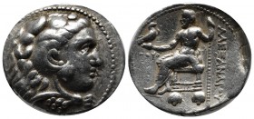 Kings of Macedon. Alexander III. 336-323 BC. AR Tetradrachm (27mm, 17.07g). Ake-Ptolemais mint. Struck 316/5 BC. Head of Herakles right, wearing lion'...