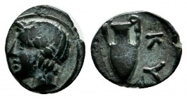 Mysia, Kyzikos, circa 400 BC. AE (10mm, 0.67g). Laureate head of Apollo left. / [KY] -HI. Amphora; below, tunny right. SNG Copenhagen 57.