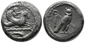 Phoenicia, Tyre, Circa 425-394 BC. AR Stater (23mm, 13.73g). Melkart, holding bow in extended left hand and reins in right, riding hippocamp to right;...
