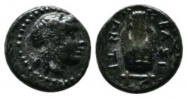 Seleukid Kingdom,Antiochos II Theos, c.261-246 BC. Sardes. AE (10mm-1.36g). Laureate head of Apollo right. / BAΣI / ANTI. Lyre. Controls: Monogram to ...