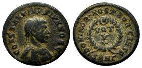 Constantine II. Caesar, AD 317-337. AE Follis (18mm, 3.22g). Heraclea, Struck AD 324. Laureate, draped and cuirassed bust right. / VOT V in laurel wre...