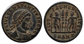 Constantius II. Caesar, AD 324-337. AE Follis (17mm, 2.50g). Antioch, AD 330-5. Laureate and cuirassed bust right. / Two soldiers flanking two standar...