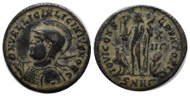 Licinius II. Caesar, AD 317-324. AE Follis (20mm, 3.15g). Heraclea. Helmeted and cuirassed bust left, holding spear over shoulder and shield on arm. /...